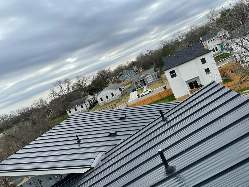 Standing seam metal roof panels with vents for Skylight Repair in Manchester